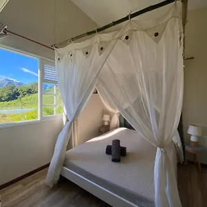  Séjour chez l'habitant Et Sdb Privative Roucou Vue Mont Pelee Dans Maison Partagee